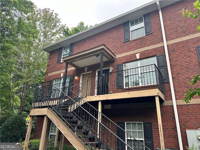 105 Whitehead Rd Unit 10, Athens, GA 30606 - rear view of property featuring brick siding and stairs