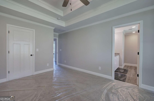 315 Arbor Cir, Rockmart, GA 30153 - unfurnished bedroom with carpet, baseboards, crown molding, ceiling fan, and a tray ceiling