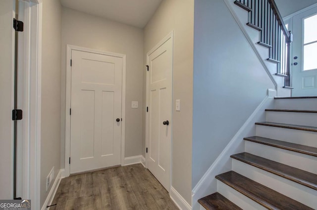 315 Arbor Cir, Rockmart, GA 30153 - stairway featuring wood finished floors and baseboards