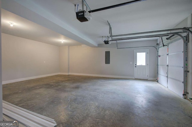 315 Arbor Cir, Rockmart, GA 30153 - garage featuring electric panel, a garage door opener, and baseboards