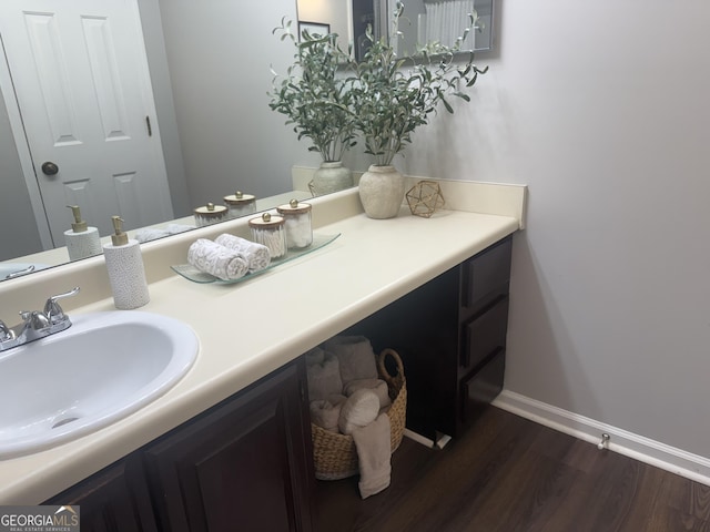 3915 Woodridge Way, Tucker, GA 30084 - bathroom with wood finished floors and vanity