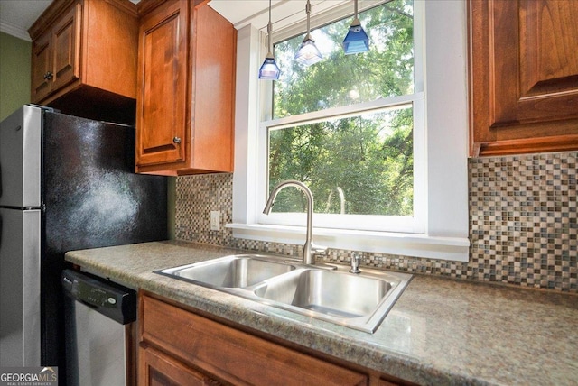 546 Pulaski St, Athens, GA 30601 - kitchen with a sink, stainless steel appliances, brown cabinetry, and plenty of natural light