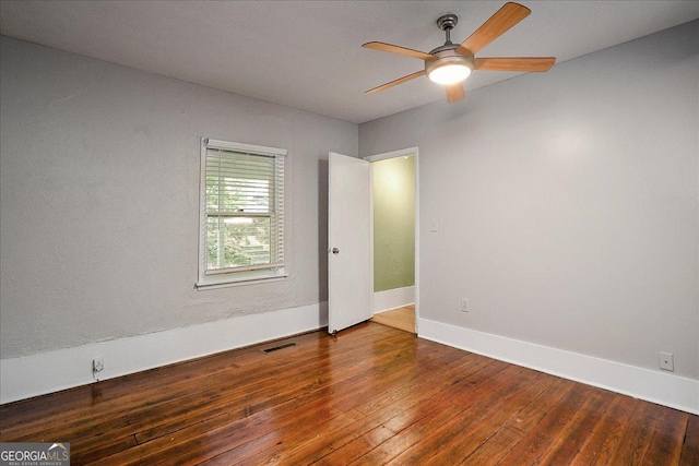 546 Pulaski St, Athens, GA 30601 - empty room featuring a ceiling fan, hardwood / wood-style floors, and baseboards