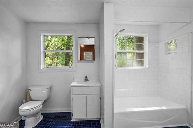 546 Pulaski St, Athens, GA 30601 - full bath featuring toilet, vanity, healthy amount of natural light, and tile patterned flooring