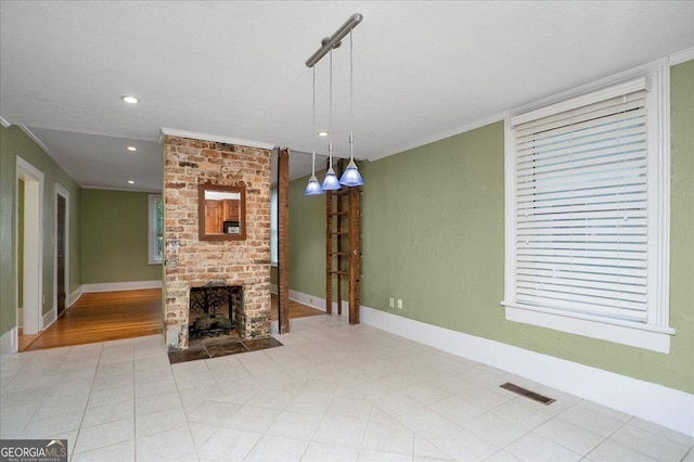546 Pulaski St, Athens, GA 30601 - unfurnished living room with crown molding, baseboards, recessed lighting, a fireplace, and tile patterned flooring