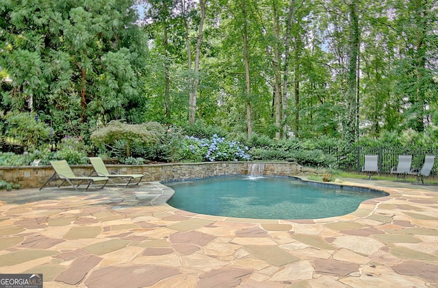 505 Lighthouse Ln, Peachtree City, GA 30269 - swimming pool featuring a patio