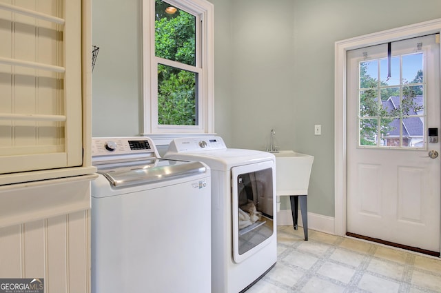 505 Lighthouse Ln, Peachtree City, GA 30269 - washroom with washing machine and dryer, light flooring, and baseboards