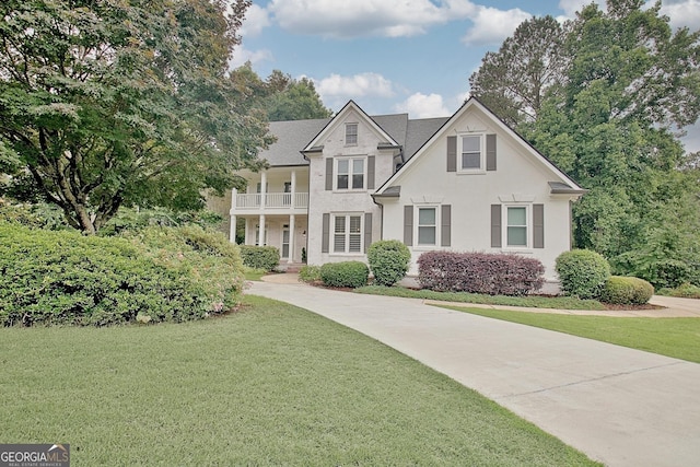 505 Lighthouse Ln, Peachtree City, GA 30269 - view of front of property with a front yard and a balcony