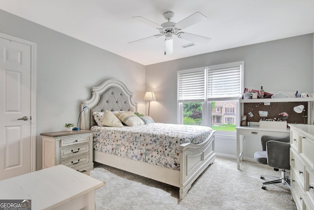 505 Lighthouse Ln, Peachtree City, GA 30269 - bedroom with light carpet, a desk, and a ceiling fan