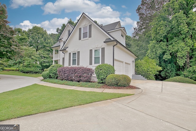 505 Lighthouse Ln, Peachtree City, GA 30269 - view of front of property featuring driveway, stucco siding, and a front lawn