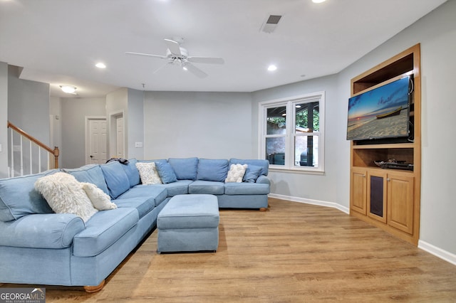505 Lighthouse Ln, Peachtree City, GA 30269 - living room with recessed lighting, light wood finished floors, baseboards, ceiling fan, and stairway