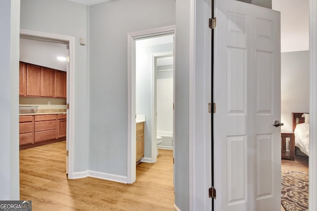505 Lighthouse Ln, Peachtree City, GA 30269 - corridor featuring light wood-type flooring and baseboards