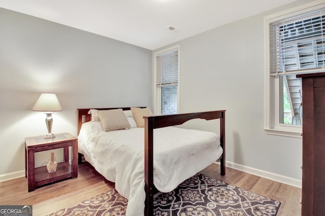 505 Lighthouse Ln, Peachtree City, GA 30269 - bedroom featuring wood finished floors and baseboards