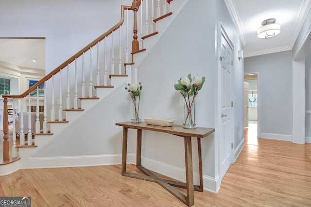 505 Lighthouse Ln, Peachtree City, GA 30269 - stairway featuring wood finished floors, ornamental molding, and baseboards