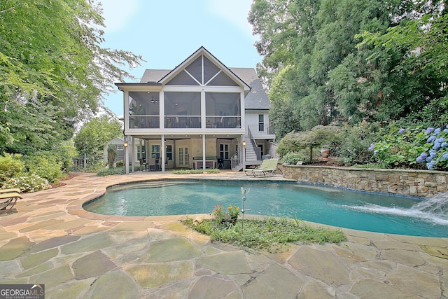 505 Lighthouse Ln, Peachtree City, GA 30269 - outdoor pool featuring a sunroom, a patio, and stairway