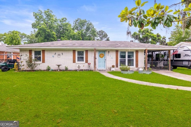314 Clifton Dr, Port Wentworth, GA 31407 - ranch-style house with brick siding, a front lawn, and driveway