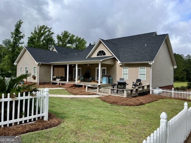 657 Halls Bridge Rd, Swainsboro, GA 30401 - back of property featuring a patio and roof with shingles