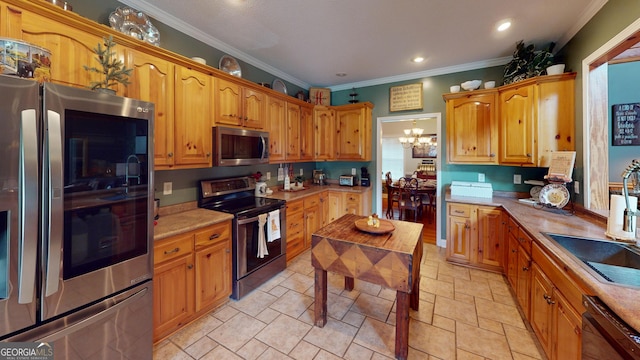 657 Halls Bridge Rd, Swainsboro, GA 30401 - kitchen featuring appliances with stainless steel finishes, ornamental molding, a chandelier, stone tile floors, and light countertops