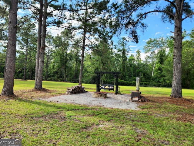 657 Halls Bridge Rd, Swainsboro, GA 30401 - view of grassy yard with a pergola