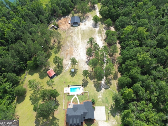 657 Halls Bridge Rd, Swainsboro, GA 30401 - aerial overview of property's location featuring a pool and a heavily wooded area