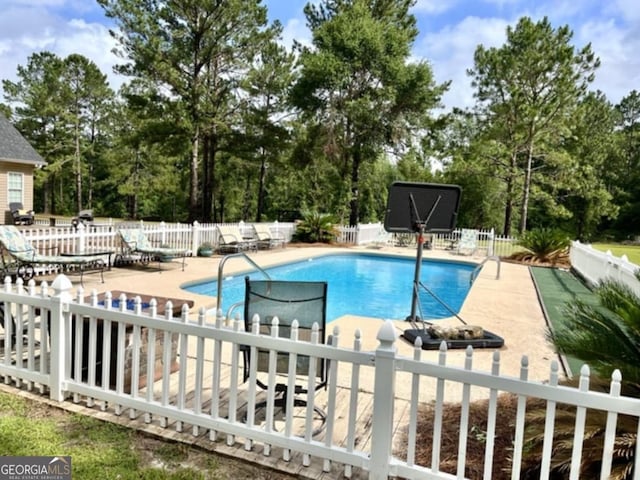 657 Halls Bridge Rd, Swainsboro, GA 30401 - view of pool with a patio area and view of wooded area
