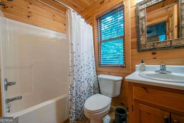 9 Dean Ct, Blue Ridge, GA 30513 - full bath featuring vanity, wooden walls, toilet, and shower / bath combo with shower curtain
