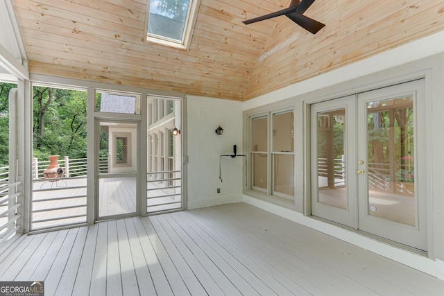 2230 Huntingdon Ct, Gainesville, GA 30506 - unfurnished sunroom with french doors, a skylight, and lofted ceiling