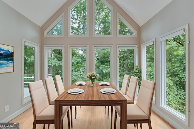 2230 Huntingdon Ct, Gainesville, GA 30506 - sunroom / solarium with high vaulted ceiling, healthy amount of natural light, and wood finished floors