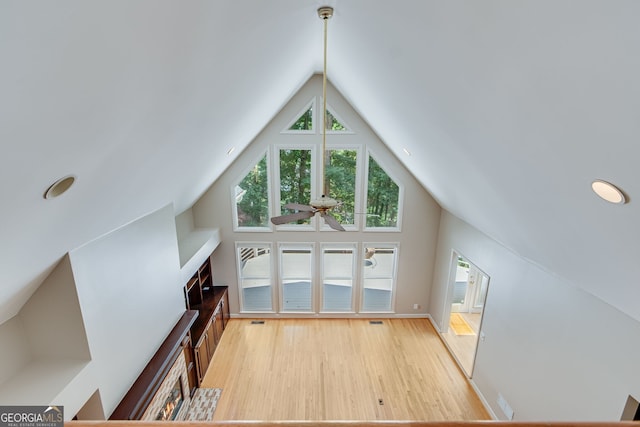 2230 Huntingdon Ct, Gainesville, GA 30506 - additional living space with wood finished floors, a ceiling fan, high vaulted ceiling, and recessed lighting