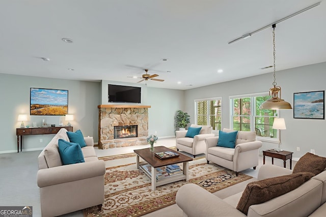 2230 Huntingdon Ct, Gainesville, GA 30506 - living area featuring a ceiling fan, a stone fireplace, and recessed lighting