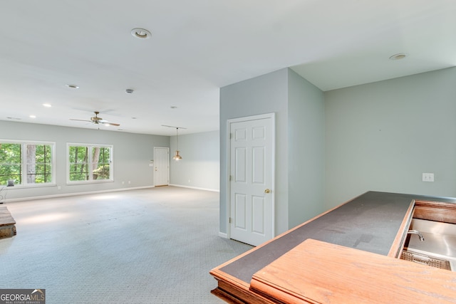 2230 Huntingdon Ct, Gainesville, GA 30506 - kitchen with ceiling fan, carpet floors, and recessed lighting