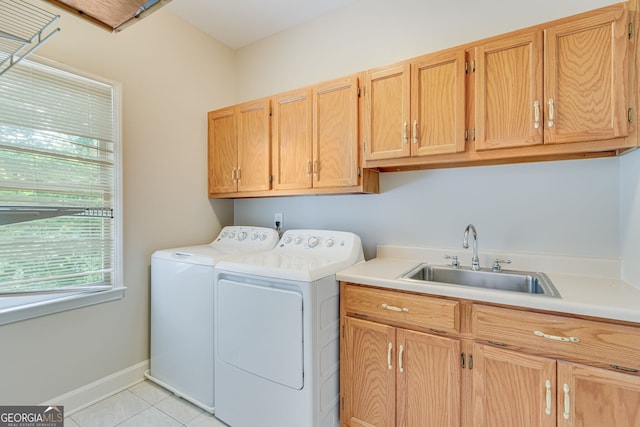 2230 Huntingdon Ct, Gainesville, GA 30506 - laundry room with washing machine and dryer, cabinet space, and light tile patterned flooring