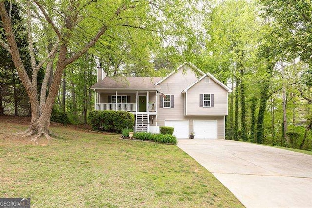 69 Due W Pass, Dallas, GA 30157 - view of front of property featuring stairway, a porch, a chimney, a garage, and driveway