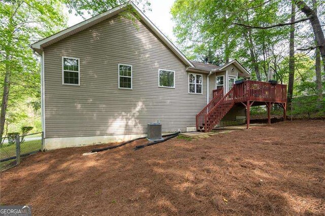 69 Due W Pass, Dallas, GA 30157 - back of house featuring stairs and a deck