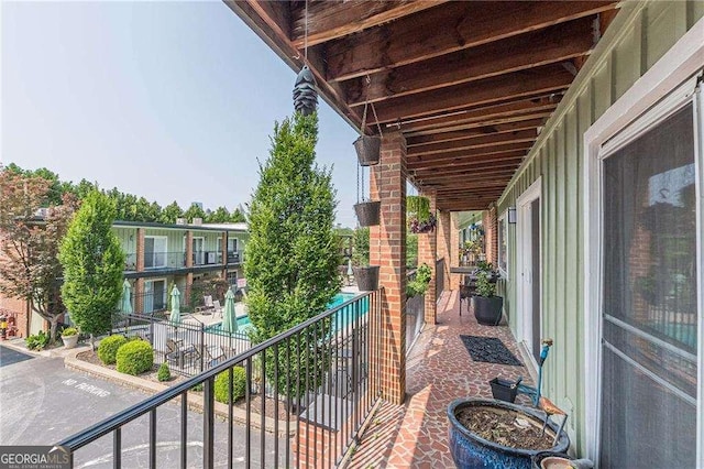 1705 Monroe Dr NE Unit D05, Atlanta, GA 30324 - balcony featuring view of pool area
