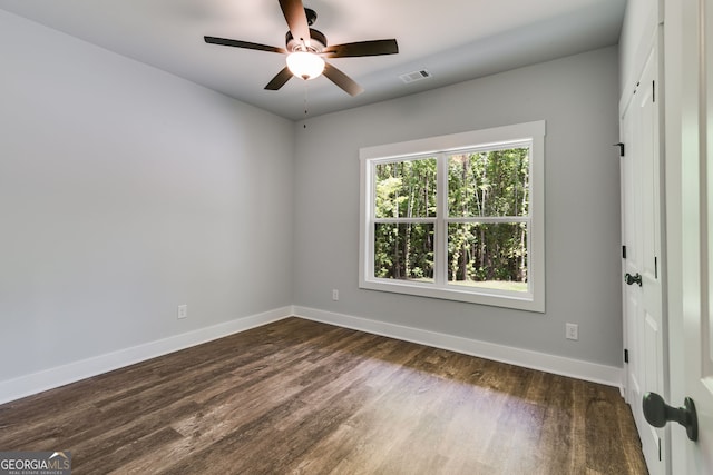 TRACT3 Georgia Highway 100, Buchanan, GA 30113 - spare room with ceiling fan and dark wood-style floors