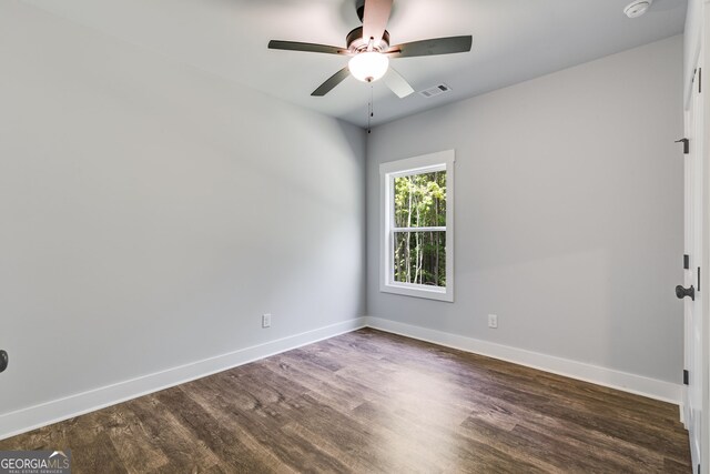TRACT3 Georgia Highway 100, Buchanan, GA 30113 - empty room with a ceiling fan, dark wood-type flooring, and a smoke detector