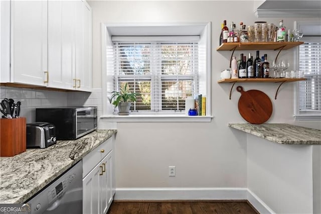 802 Frederica St NE Unit 5, Atlanta, GA 30306 - kitchen with dishwasher, decorative backsplash, white cabinets, and baseboards