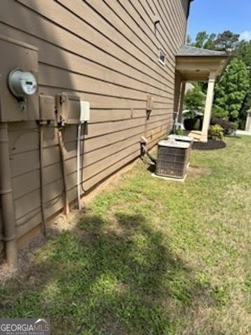 121 Fountain Oak, Villa Rica, GA 30180 - view of property exterior with a lawn