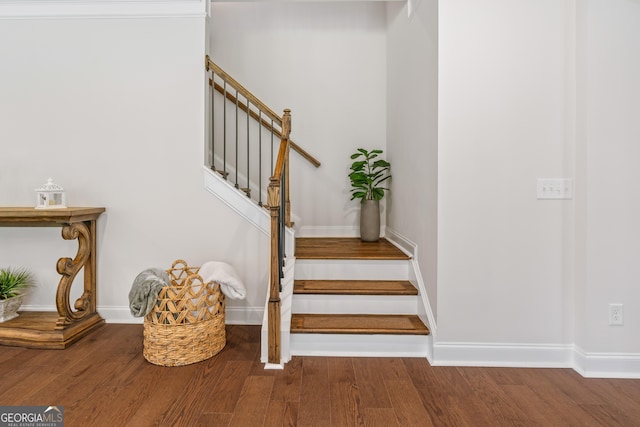 2884 Porches Ln, Dacula, GA 30019 - stairway with wood finished floors and baseboards