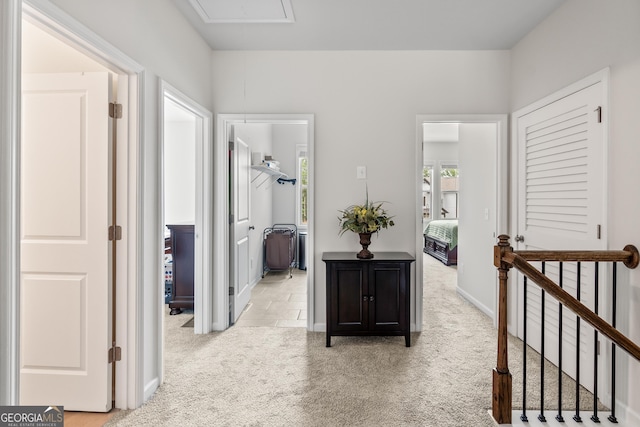 2884 Porches Ln, Dacula, GA 30019 - corridor with attic access, carpet flooring, and baseboards