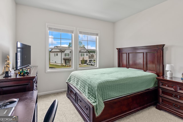 2884 Porches Ln, Dacula, GA 30019 - bedroom featuring light carpet and baseboards