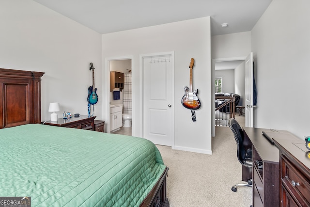 2884 Porches Ln, Dacula, GA 30019 - bedroom featuring light carpet, an office area, connected bathroom, and baseboards