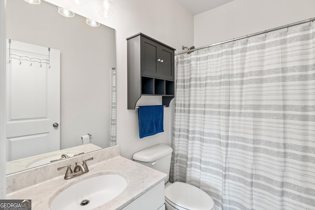 2884 Porches Ln, Dacula, GA 30019 - bathroom featuring vanity, toilet, and a shower with shower curtain