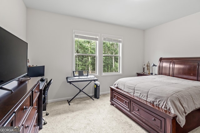 2884 Porches Ln, Dacula, GA 30019 - bedroom featuring light colored carpet, baseboards, and an office area