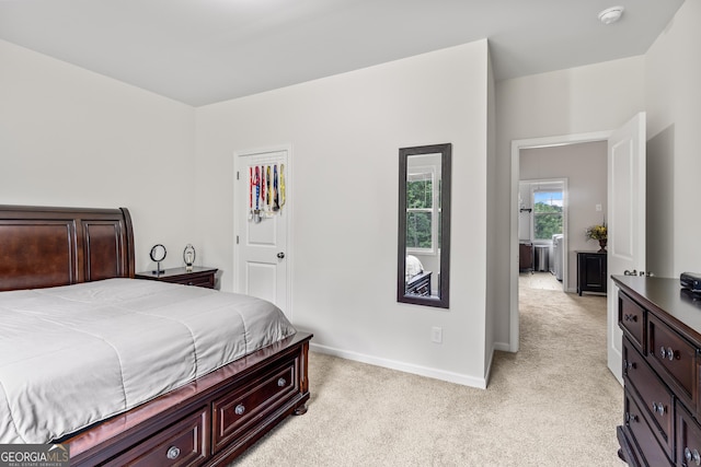2884 Porches Ln, Dacula, GA 30019 - bedroom with light colored carpet and baseboards