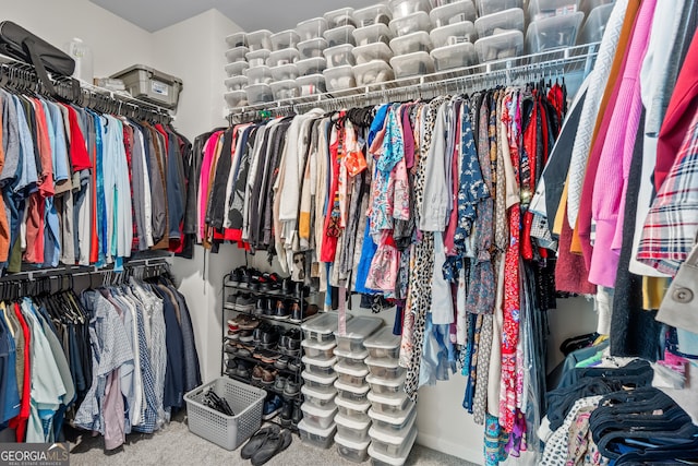 2884 Porches Ln, Dacula, GA 30019 - walk in closet featuring carpet flooring