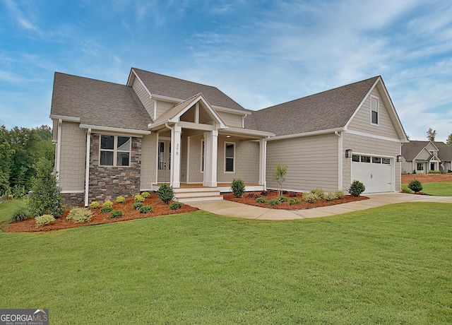 375 Werner Way, Senoia, GA 30276 - craftsman-style home featuring a garage, covered porch, a front lawn, and roof with shingles