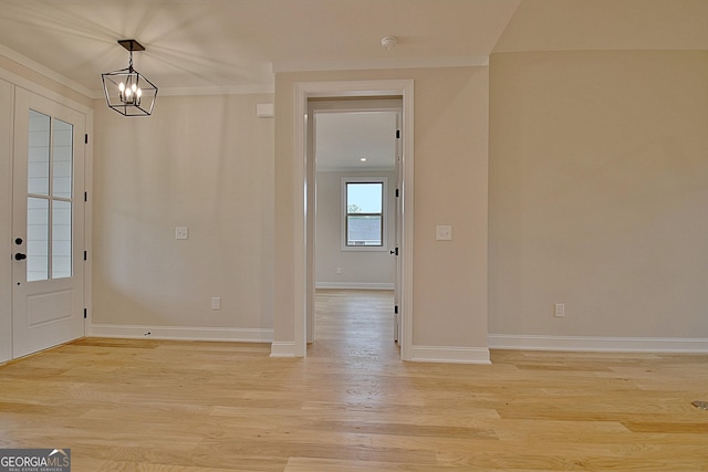 375 Werner Way, Senoia, GA 30276 - foyer entrance featuring a chandelier, light wood finished floors, and crown molding