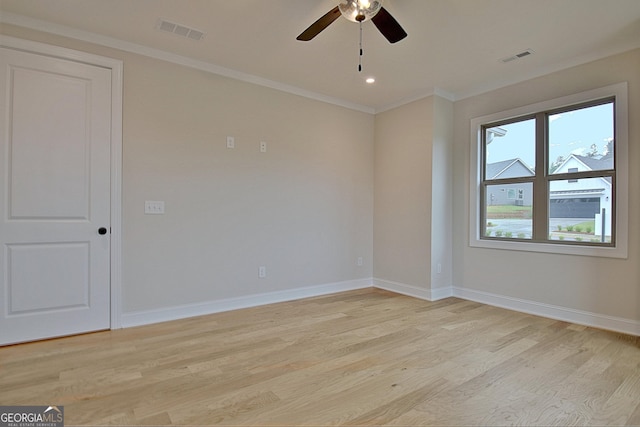 375 Werner Way, Senoia, GA 30276 - unfurnished room with light wood finished floors, a ceiling fan, and ornamental molding